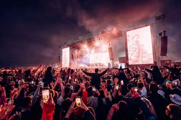 A huge Manchester band could be about to make a very big announcement and homecoming fans think it's going to be local