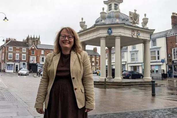 Councillor Allison Healy, Mayor of Beverley at the Grade I listed Beverley Market Cross 