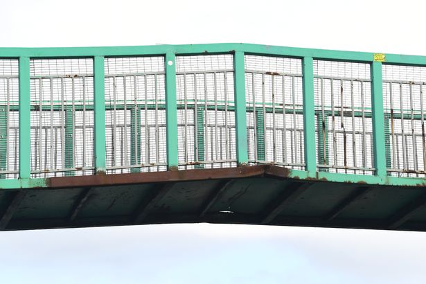Damage to the pedestrian bridge on Dunnings Bridge Road before it was demolished in 2022
