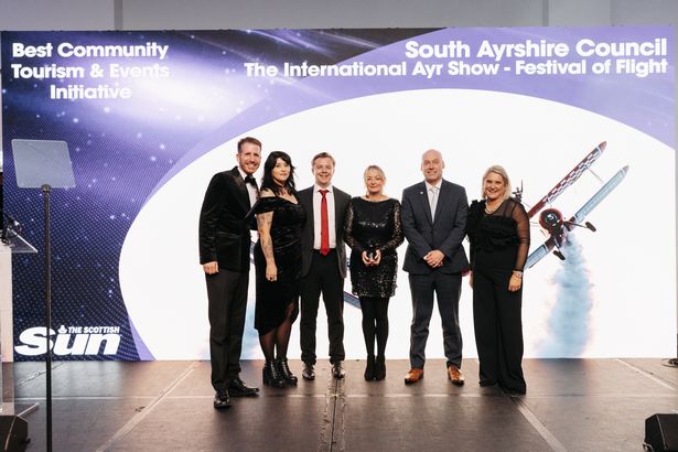 Award host Garry Spence, the team from South Ayrshire Council, and Gemma Mair from category sponsor, The Scottish Sun