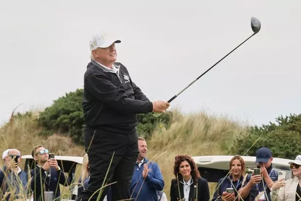 A photo of Donald Trump playing golf 