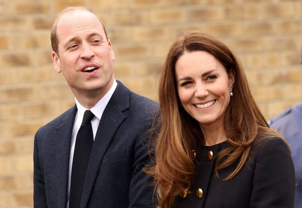 Prince William and Princess Kate stood beside each other.