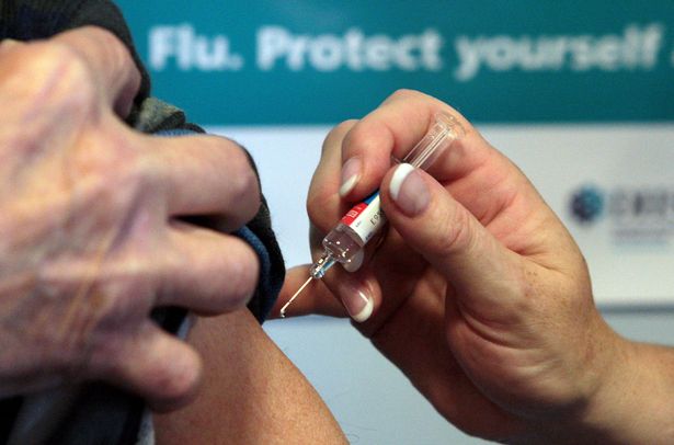 a patient receiving the seasonal flu vaccine