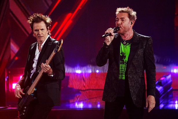 LOS ANGELES, CALIFORNIA - NOVEMBER 05: (L-R) John Taylor and Simon Le Bon of Duran Duran perform on stage during the 37th Annual Rock & Roll Hall Of Fame Induction Ceremony at Microsoft Theater on November 05, 2022 in Los Angeles, California. (Photo by Jeff Kravitz/FilmMagic)