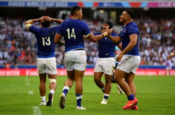  Nigel Ah-Wong of Samoa celebrates with Sama Malolo of Samoa