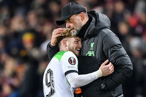 PRAGUE, CZECH REPUBLIC - MARCH 7: Harvey Elliott of Liverpool (L) and head coach of Liverpool Jurgen Klopp (R) hug each ot during the UEFA Europa League round of 16 second leg match between Sparta Prague and Liverpool FC at Epet Arena (Letna) in Prague, Czech Republic on March 7, 2024. (Photo by Lukas Kabon/Anadolu via Getty Images)
