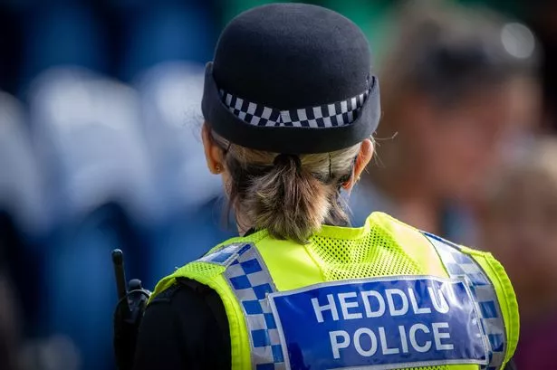 Police officer on patrol in Wales.