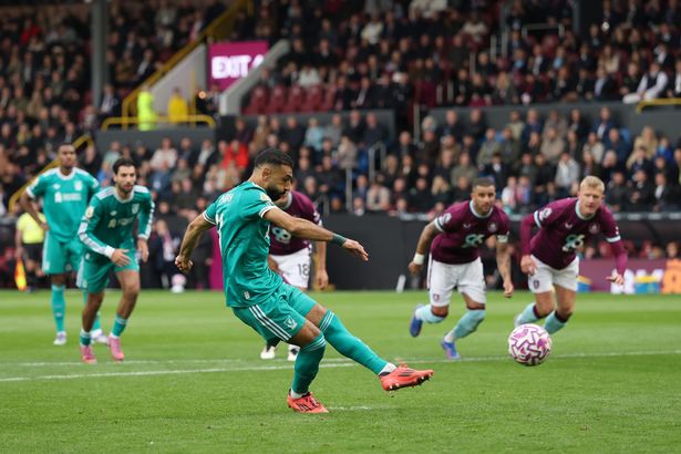 Mohamed Salah of Liverpool scores his team's first goal from the penalty spot during the Premier League match between Burnley and Liverpool