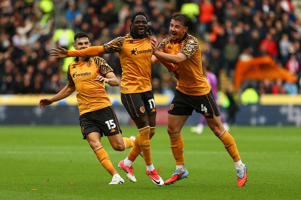 John Egan, David Akintola, and Charlie Hughes celebrate against Sheffield United