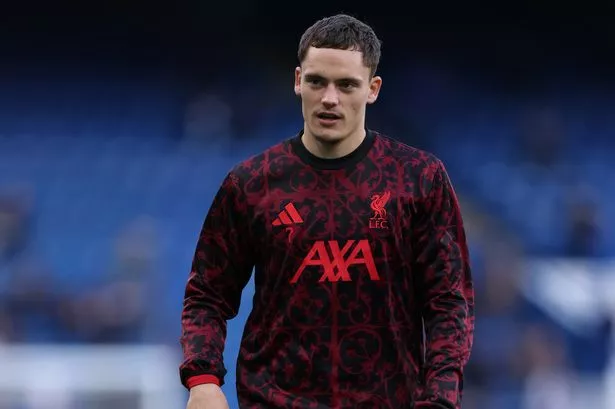 Florian Wirtz of Liverpool warms up prior to the Premier League match between Chelsea and Liverpool at Stamford Bridge