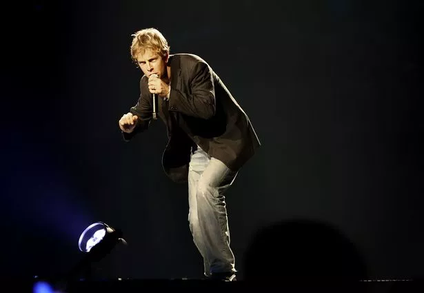 MIAMI, FLORIDA - OCTOBER 09: Tom Odell performs onstage during "Hit Me Hard And Soft: The Tour" at Kaseya Center on October 09, 2025 in Miami, Florida. (Photo by Arturo Holmes/Getty Images for Live Nation)