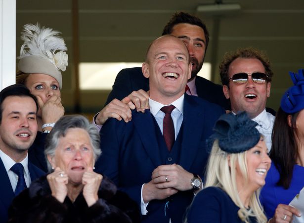 Zara Phillips, Mike Tindall and James Simpson-Daniel (right) watch their horse Monbeg Dude run in the Grand National as they attend day 3 'Grand National Day' of the Crabbie's Grand National Festival at Aintree Racecourse on April 11, 2015 in Liverpool, England.