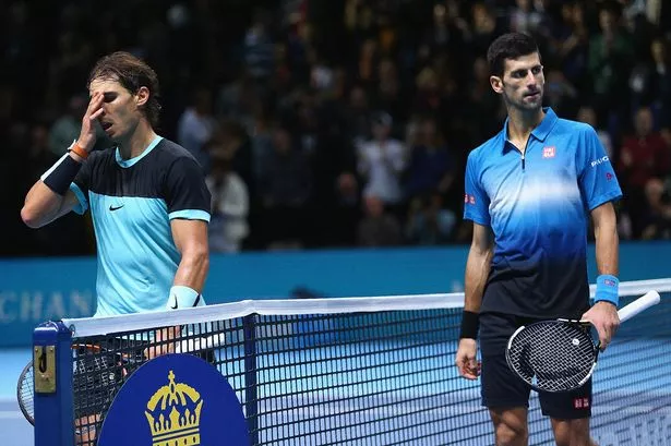 Rafael Nadal of Spain shows his emotions after his straight sets defeat by Novak Djokovic of Serbia during the men's singles semi final match on day seven of the Barclays ATP World Tour Finals at O2 Arena on November 21, 2015 in London, England. 