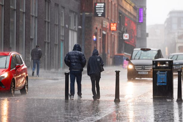 Heavy rain in Liverpool city centre today