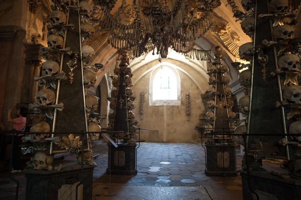 Human skulls and bones in The Bone Church, or Sedlec Ossuary