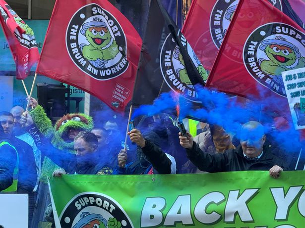 Striking bin workers in Birmingham city centre 