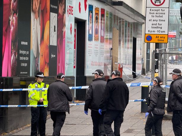 Forensics officers have been looking in bins and conducting a thorough search of the city centre scene