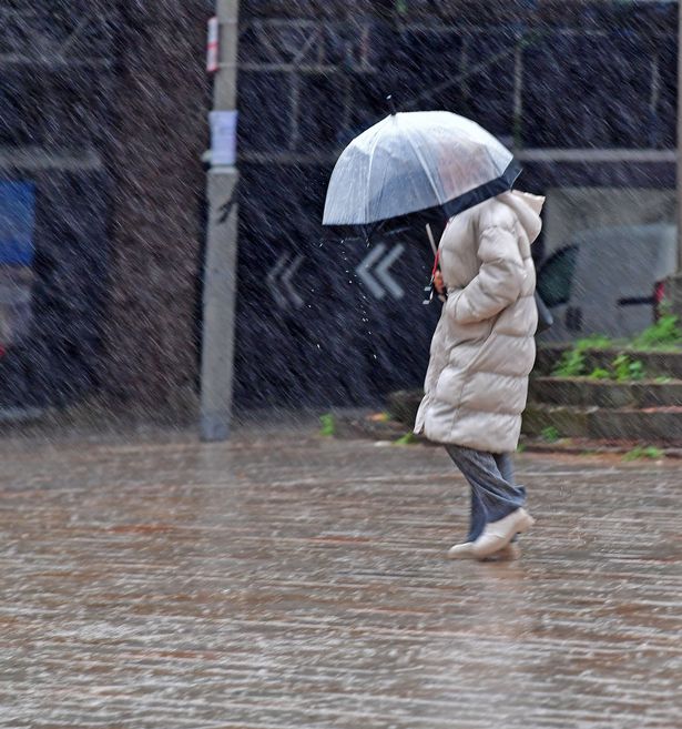 Heavy rain in Liverpool city centre. Photo by Colin Lane