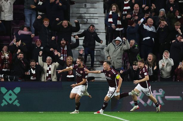 Craig Halkett sparks wild scenes in the stands and on pitch wit Hearts pals after late Hibs winner
