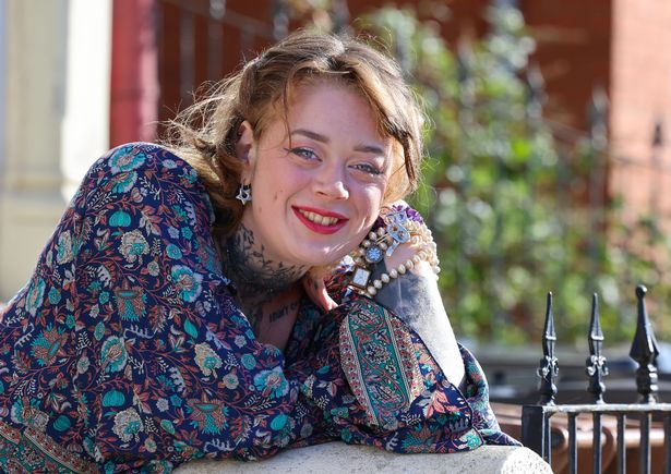 Autumn Woods is a musician, playing the guitar and writing her own songs