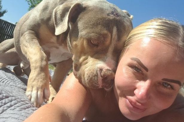 Emma Guy with her pet dog