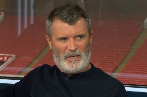 Roy Keane looks on 