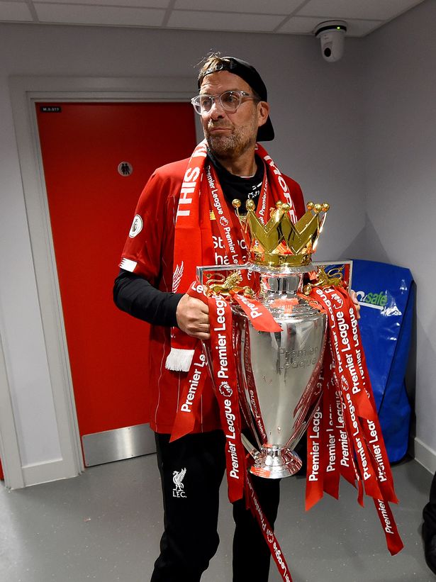 Jurgen Klopp manager of Liverpool with the Premier League trophy in the tunnel at the end of the Premier League match between Liverpool FC and Chelsea FC at Anfield on July 22, 2020 in Liverpool, England