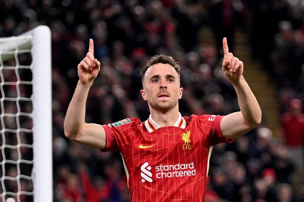 LIVERPOOL, ENGLAND - SEPTEMBER 25: (THE SUN OUT, THE SUN ON SUNDAY OUT) Diogo Jota of Liverpool celebrating after scoring the second goal during the Carabao Cup Third Round match between Liverpool and West Ham United at Anfield on September 25, 2024 in Liverpool, England. (Photo by Andrew Powell/Liverpool FC via Getty Images)