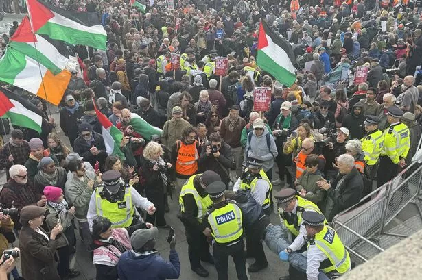 Police detain protestors in London on Saturday