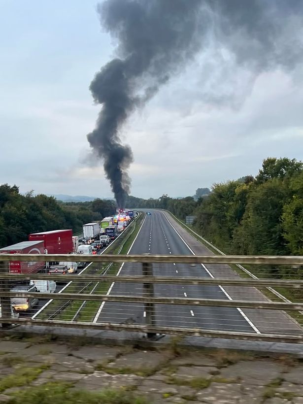 A car transporter carrying electric vehicles burst into flames on the M5