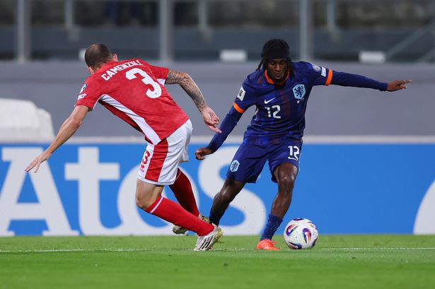 Jeremie Frimpong of Netherlands is challenged by Ryan Camenzuli of Malta during the FIFA World Cup 2026 qualifier match between Malta and Netherlands