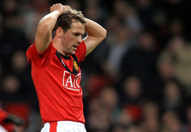 Manchester United's English forward Michael Owen reacts after missing a chance during the English Premier League football match between Manchester United and Aston Villa at Old Trafford, Manchester, north-west England on December 12, 2009. 