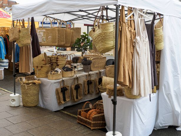 Market stall selling handmade woven eco bags, Lymington, Hampshire, UK. (Photo by: Nik Taylor/UCG/Universal Images Group via Getty Images)