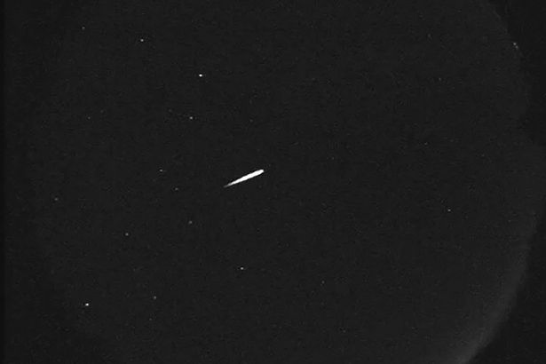A photo provided by NASA shows a meteor from the Orionid shower on October 13, 2015 