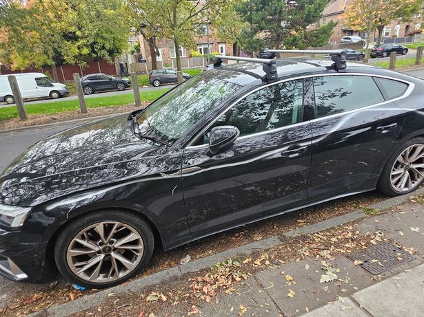 The cars spray-painted on Woolton Road in Garston