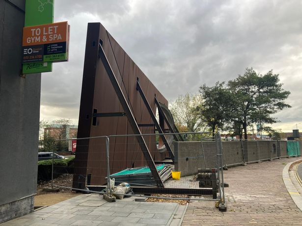 Metal support beams have been attached to the structure