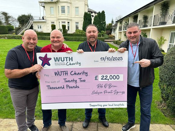Rob (second from right) and colleagues from Exclusive Private Signings present a cheque for £22,000 to WUTH Charity to support neonatal care at Arrowe Park Hospital