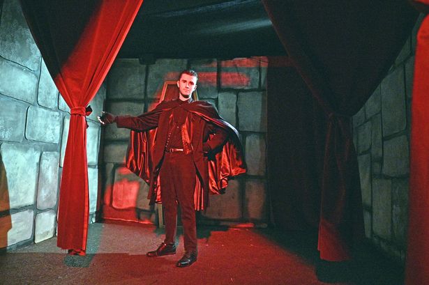 A man dressed as Dracula