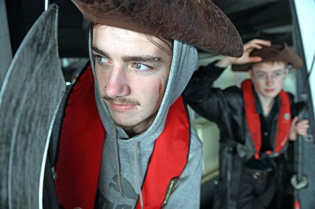 Two men dressed as pirates