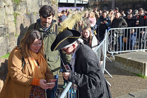 People queue for the Ghost Ship