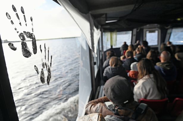 People queue for the Ghost Ship