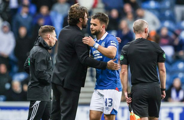 Rangers' Nicolas Raskin (R) with head coach Russell Martin