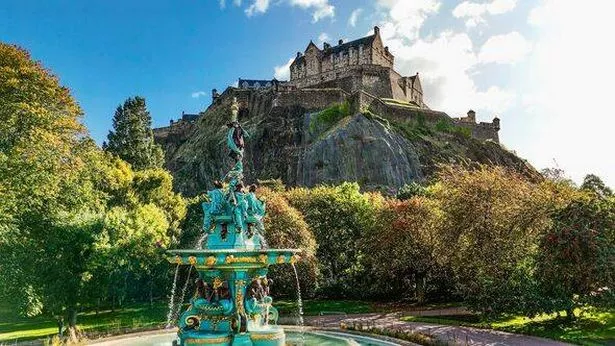 Ross Fountain in Edinburgh Princes Street Gardens with Edinburgh Castle in the background