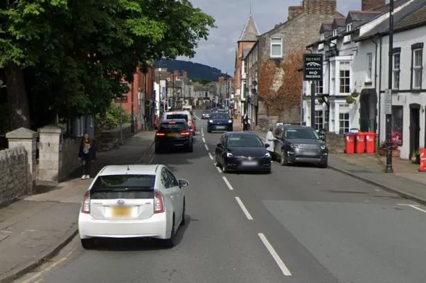 The Bridge Street at its junction with the St George Road. Cars can be seen going up and down the road