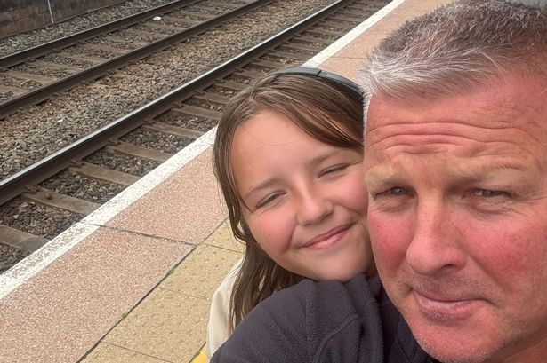 Jason Hall and his daughter