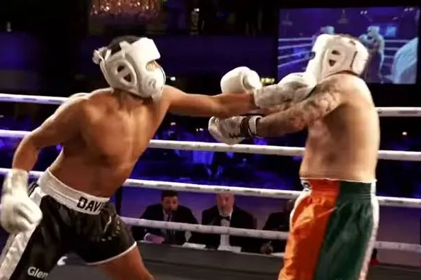 Curtis Davies and Paddy Kenny in action