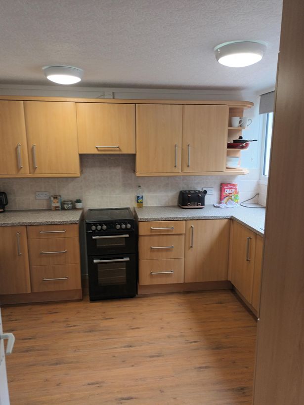 The house features a fully equipped kitchen