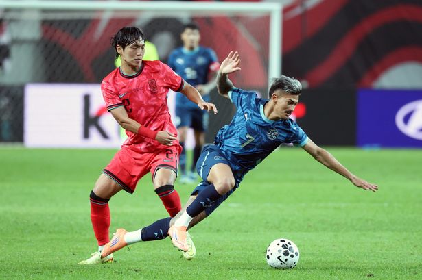  Diego Gonzalez of Paraguay is tackled by Lee Myung Jae of South Korea during the international friendly between South Korea and Paraguay at Seoul World Cup Stadium on October 14, 2025 in Seoul