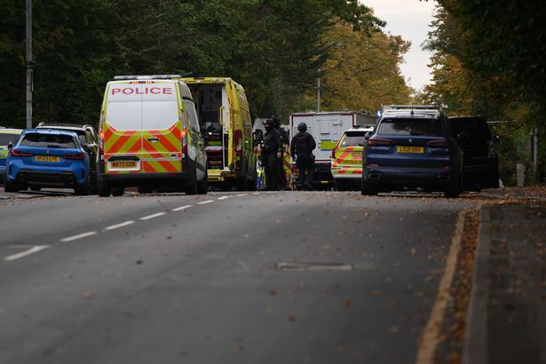 Police remain at the scene following a stabbing at Heaton Park Hebrew Congregation synagogue in Manchester, United Kingdom on October 02, 2025. A security guard was stabbed, and three people were injured, while the suspect was shot by police during the incident
