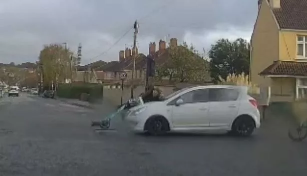 The moment the rider of an e-scooter collides head on with a car being driven on Filton Avnue in Horfield, Bristol